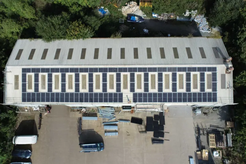 A commercial rooftop solar installation of the scale Aiko Solar modules are specified for
